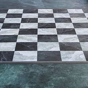 photo of marble chess and checkerboard